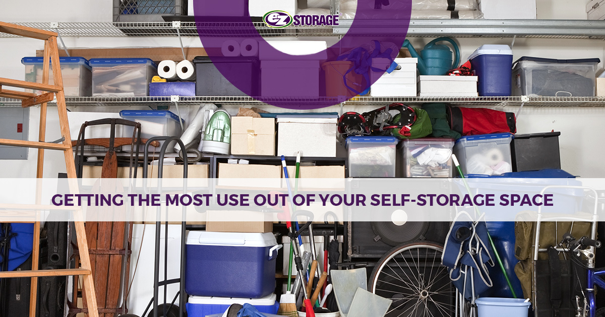 Garage full of storage boxes and other items with EZ Storage logo and text "Getting the Most Use Out Of Your Self-Storage Space"