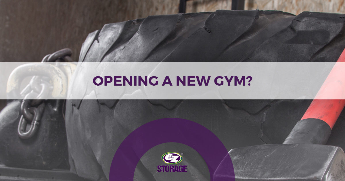 Close up of gym euipment on the ground and text "Opening a new gym?"