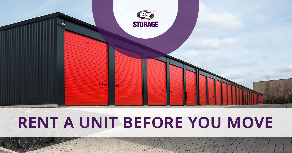 Outside view of red and black storage unit lockers and text "Rent a unit before you move"