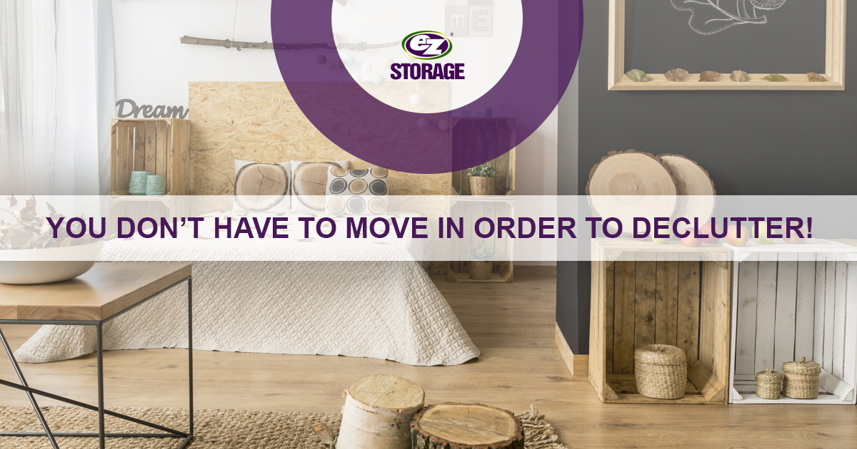 Rustic designed bedroom with EZ Storage logo and text "You Don't Have To Move In Order To Declutter!"