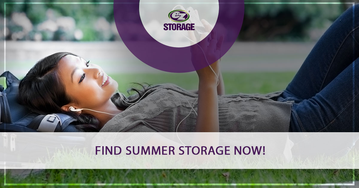 Women laying down on the grass listening to music and text "Find summer storage now"