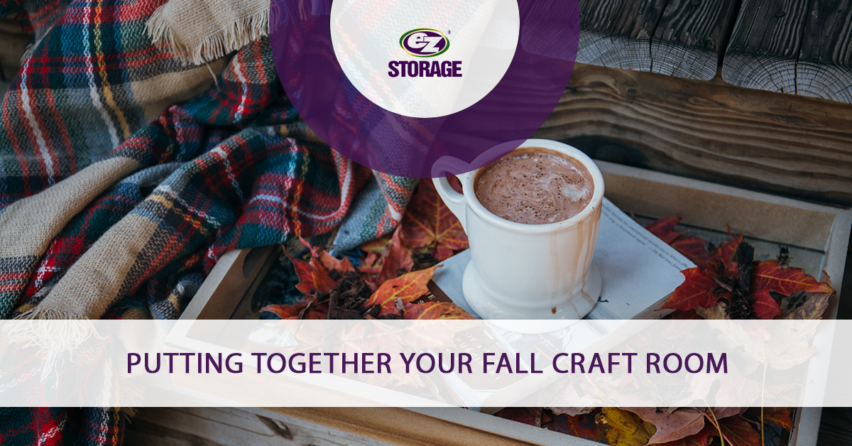 Cup of hot chocolate on a homemade wood tray and text "Putting together your fall craft room"
