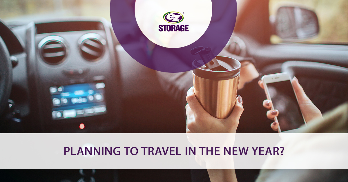 Person in a car with their feet up holding an isulated travel mug and cellphone with text "Planning to travel in the New Year?"