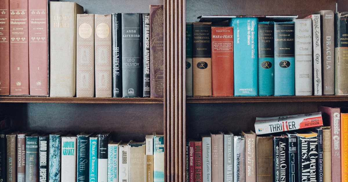 Close-up of book shelf with hardcover books