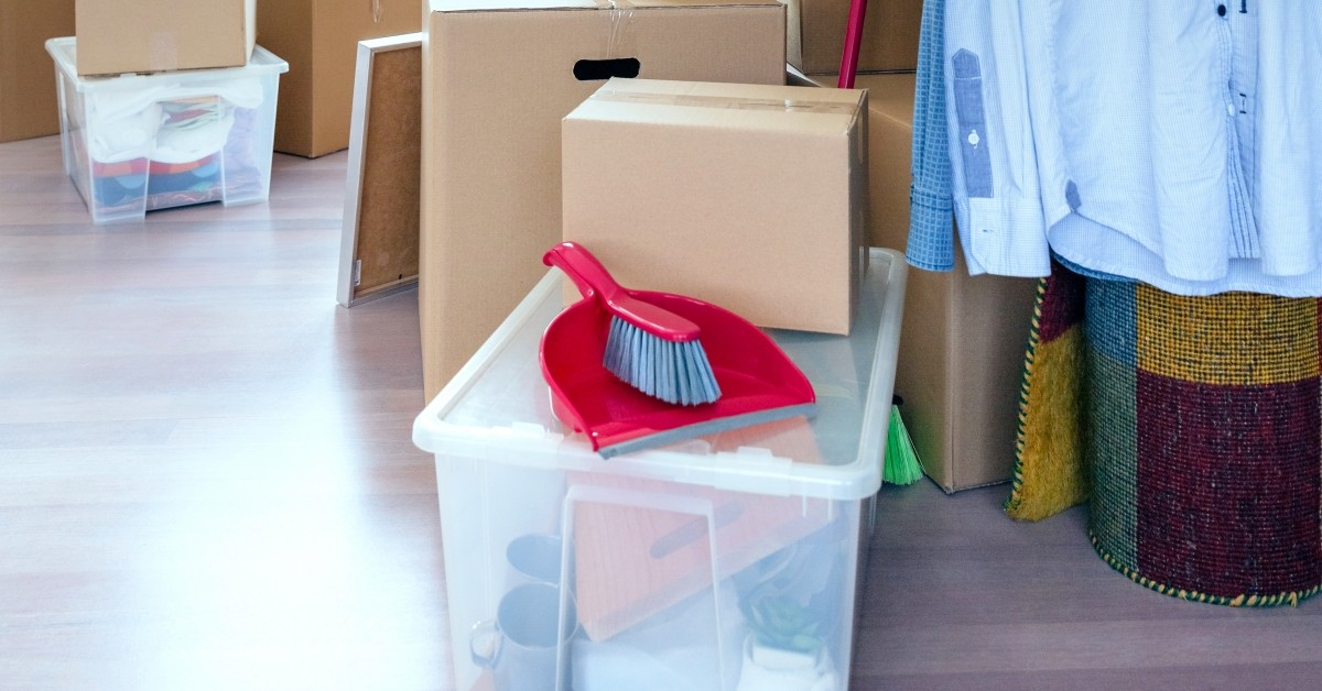 Storage bins, rolled up rug and hand dust pan