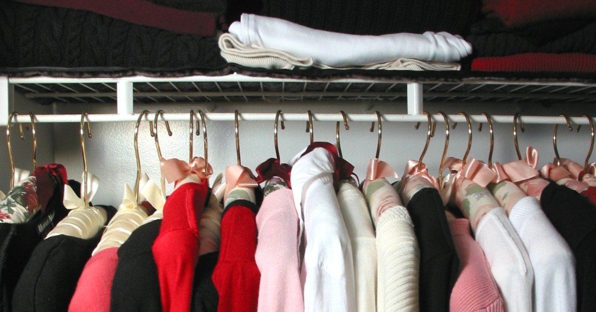 Close-up of clothes hanging in closet