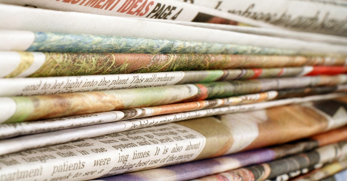 Stack of folded newspapers